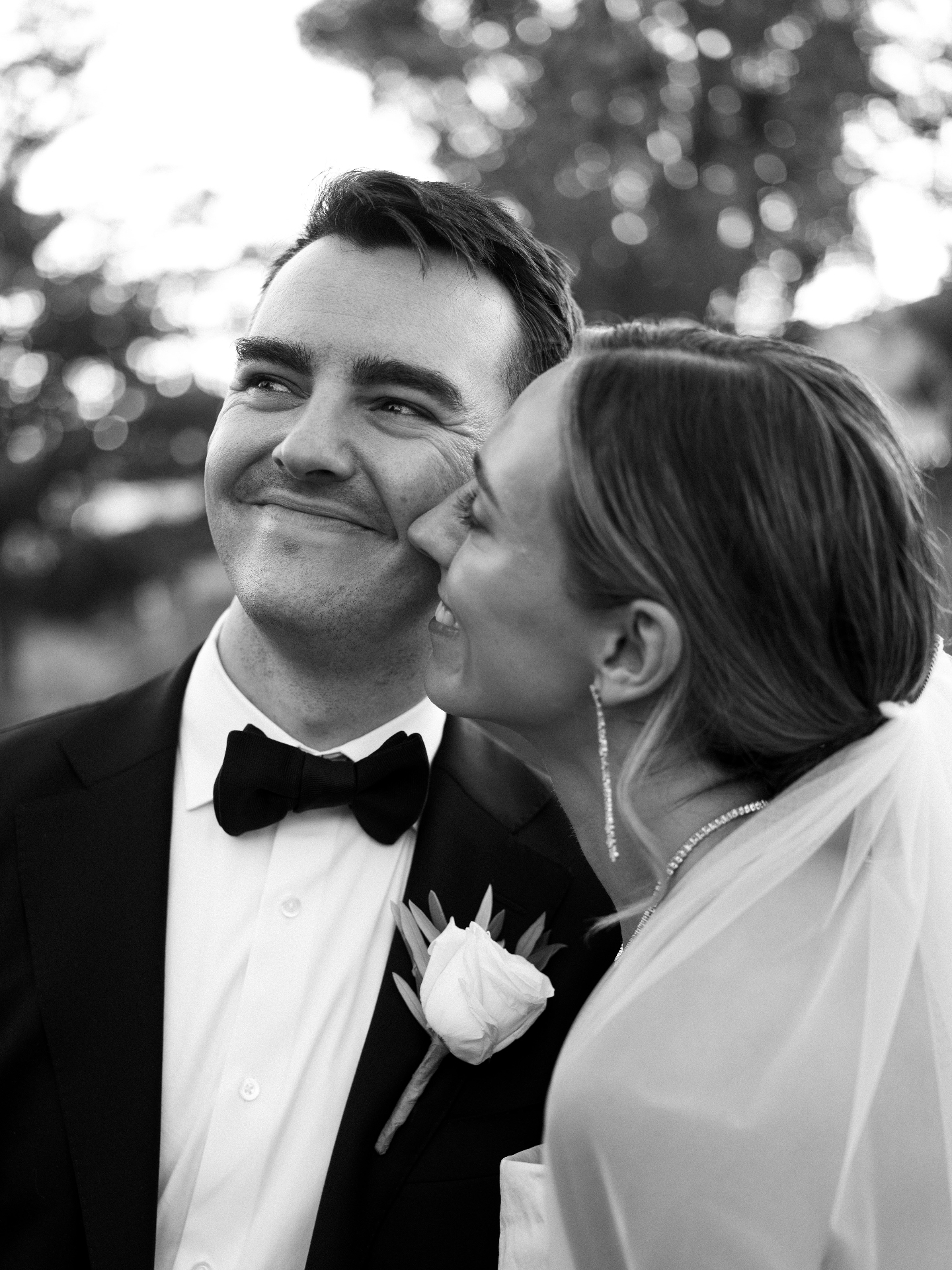 a kiss on the cheek — documentary wedding photograph by Norah Joy, Bay Area wedding photographer